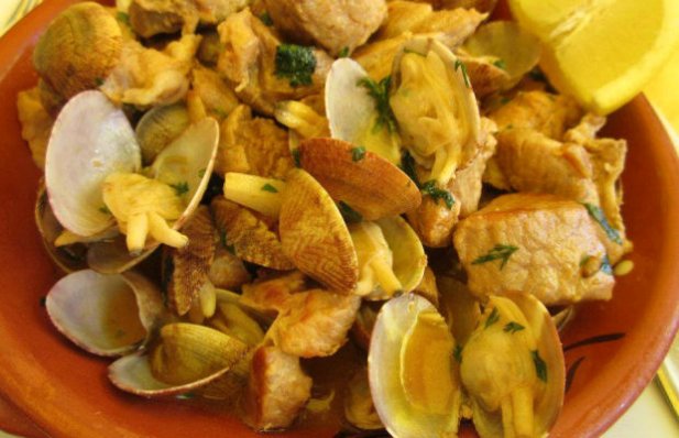 How to make the popular traditional dish,  Portuguese pork with clams (carne de porco a Alentejana).