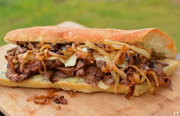 The key ingredients in this Portuguese garlic steak sandwich recipe is garlic, red wine and onions.