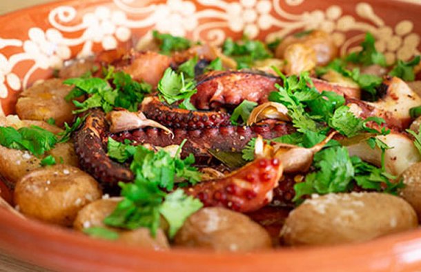 This Portuguese roasted octopus and potatoes (polvo à lagareiro) is one of the most appreciated traditional dishes in Portugal, especially in the summer.