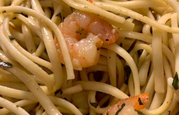 This seafood pasta recipe makes a light pasta flavored with fresh basil and it's easy and quick to make.